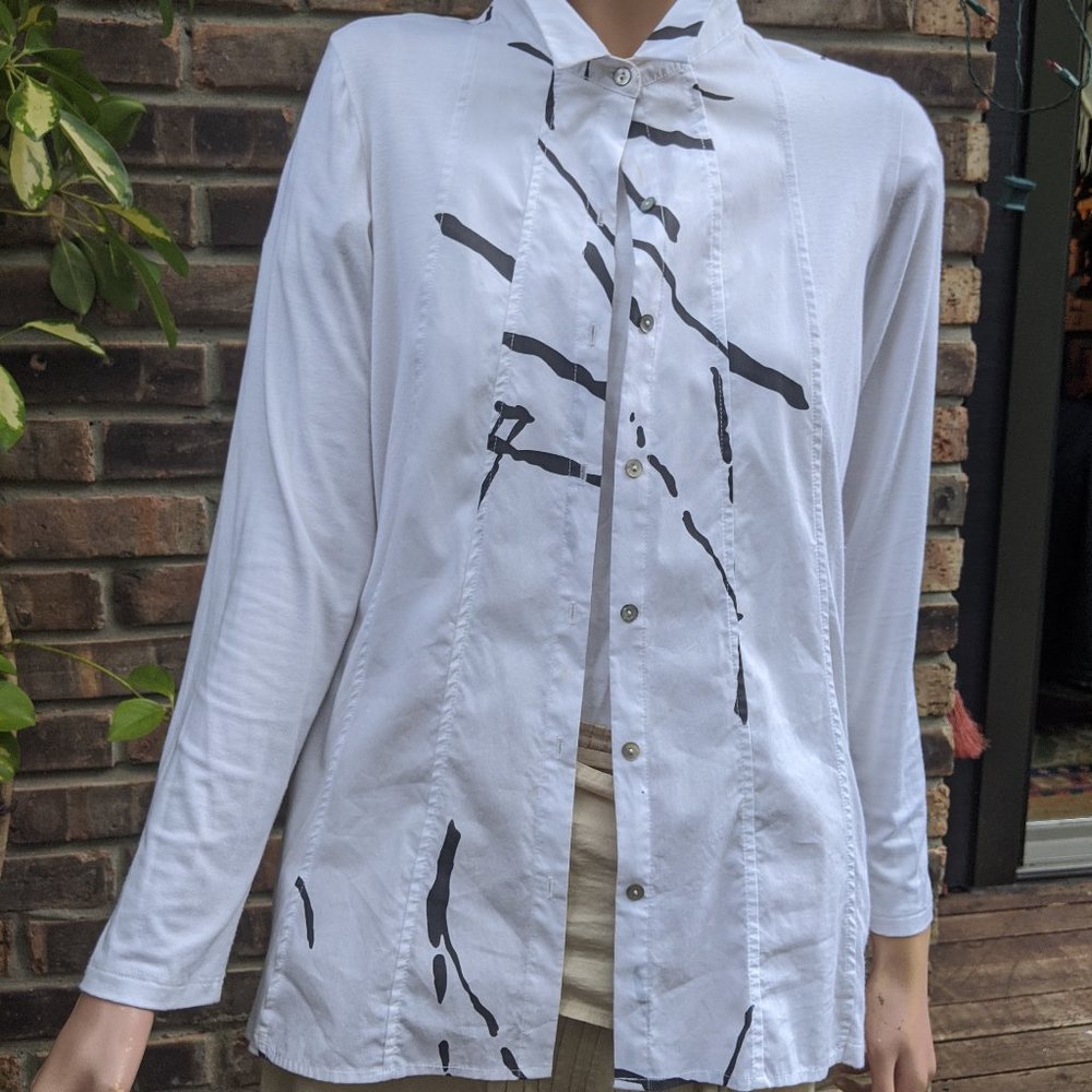 The white shirt was made by Yong Kim, of Comfy USA